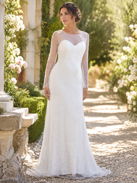 Abito da sposa in tulle ricamato luminoso con maniche lunghe trasparenti e strascico in organza di seta pura